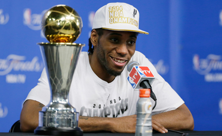 Most Valuable Player San Antonio Spurs forward Kawhi Leonard listens to a question at a news conference after  Game 5 of the NBA basketball finals against the Miami Heat on Sunday, June 15, 2014, in San Antonio. (AP)