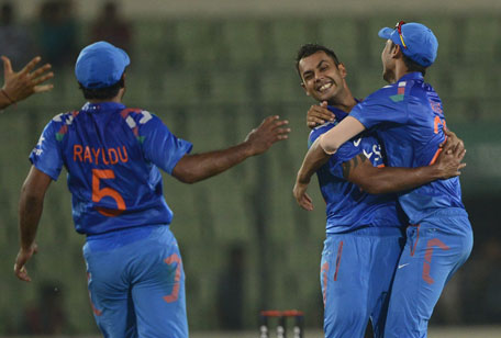 Indian bowler Stuart Binny (second right) celebrates after winning the second One Day International between India and Bangladesh at the Sher-e-Bangla National Cricket Stadium in Dhaka on June 17, 2014. (AFP)