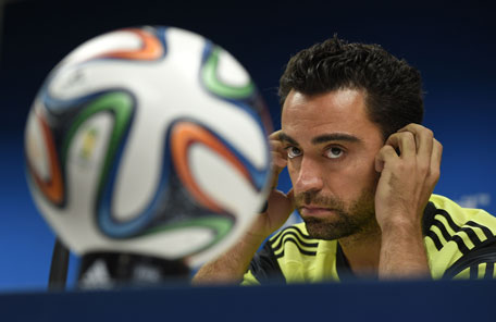 Spain's midfielder Xavi attends a press conference at the Fonte Nova Arena in Salvador on June 12, 2014. (AFP)
