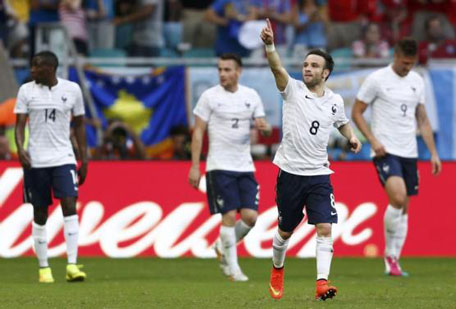 France's Mathieu Valbuena celebrates scoring his team's third goal against Switzerland during their 2014 World Cup Group E match at the Fonte Nova arena in Salvador June 20, 2014. (REUTERS)