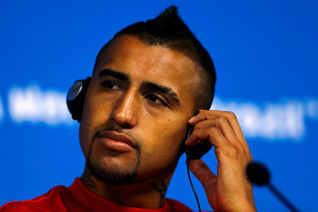 Chile's Arturo Vidal listens to a question during a news conference at the Corinthians arena in Sao Paulo city, June 22, 2014. (REUTERS)
