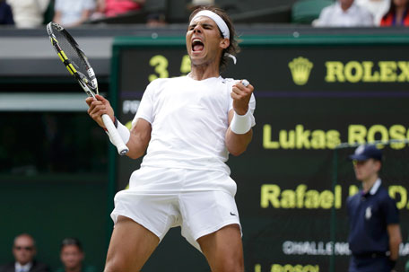 Rafael Nadal of Spain reacts after defeating Lukas Rosol of the Czech Republic in their men's singles tennis match at the Wimbledon Tennis Championships, in London June 26, 2014. (REUTERS)