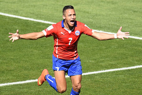 Chile's forward Alexis Sanchez celebrates after scoring a goal during the Round of 16 football match between Brazil and Chile at The Mineirao Stadium in Belo Horizonte during the 2014 FIFA World Cup on June 28, 2014. (AFP)