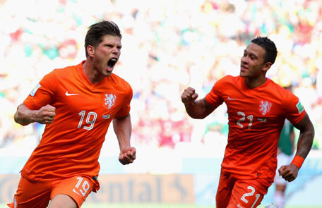 Klaas-Jan Huntelaar (left) Netherlands celebrates scoring his team's second goal on a penalty kick in stoppage time with Memphis Depay during the 2014 FIFA World Cup Brazil Round of 16 match between Netherlands and Mexico at Castelao on June 29, 2014 in Fortaleza, Brazil. (GETTY)