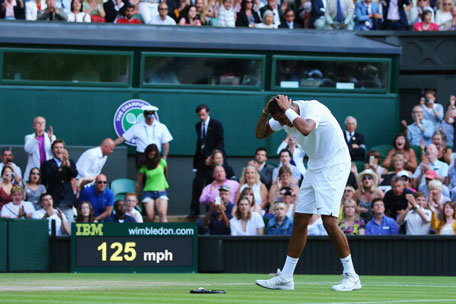 Nick Kyrgios of Australia celebrates match point and winning his Gentlemen's Singles fourth round match against Rafael Nadal of Spain on day eight of the Wimbledon Lawn Tennis Championships at the All England Lawn Tennis and Croquet Club on July 1, 2014 in London, England. (GETTY)