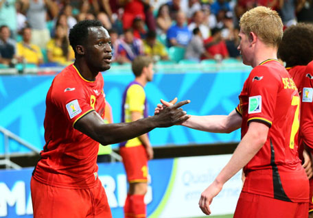 Romelu Lukaku of Belgium celebrates scoring his team's second goal with Kevin De Bruyne during the 2014 FIFA World Cup Brazil Round of 16 match between Belgium and the United States at Arena Fonte Nova on July 1, 2014 in Salvador, Brazil. (GETTY)