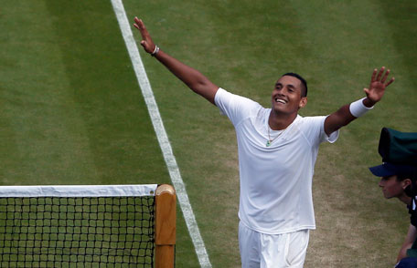 Nick Kyrgios of Australia reacts to defeating Rafael Nadal of Spain in their men's singles tennis match at the Wimbledon Tennis Championships, in London July 1, 2014. (REUTERS)