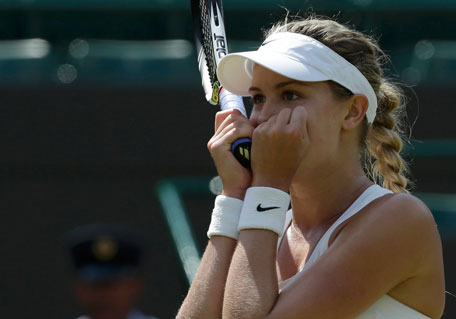 Eugenie Bouchard of Canada reacts after defeating  Angelique Kerber of Germany in their women's singles quarter-final at the Wimbledon Tennis Championships, in London July 2, 2014. (REUTERS)