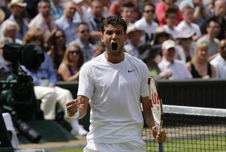 Grigor Dimitrov of Bulgaria reacts during his men's singles quarter-final tennis match against Andy Murray of Britain at the Wimbledon Tennis Championships, in London July 2, 2014. (REUTERS)