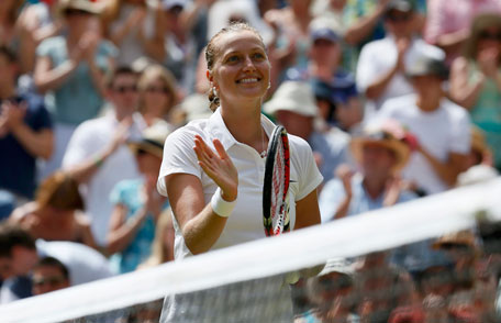 Petra Kvitova of the Czech Republic reacts after defeating Lucie Safarova of the Czech Republic in their women's singles semi-final at the Wimbledon Tennis Championships, in London July 3, 2014. (REUTERS)