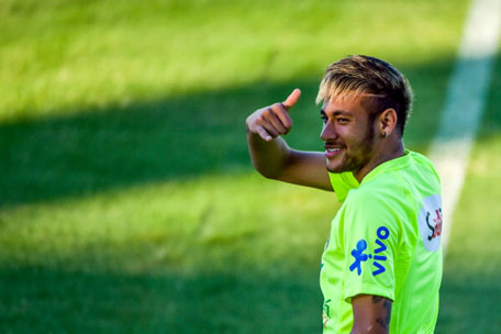 Neymar gestures during a training session at the President Vargas stadium on the eve of the FIFA World Cup 2014 quarter-final match between Brazil and Colombia in Fortaleza on July 3, 2014 in Fortaleza, Brazil. (GETTY)
