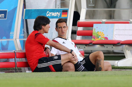 Head coach of Germany Joachim Loew chats with Miroslav Klose of Germany during the practice session on the eve of the 2014 FIFA World Cup Brazil Quarter Final match between France and Germany at Estadio Maracana on July 3, 2014 in Rio De Janeiro, Brazil. (GETTY)