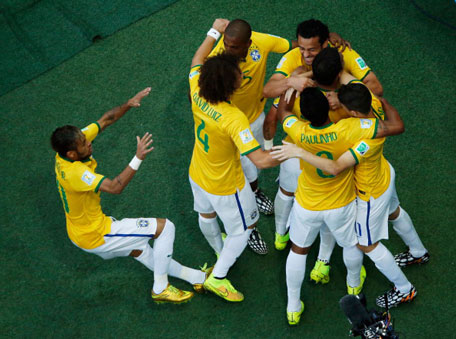 Thiago Silva of Brazil celebrates with teammates after scoring his team's first goal during the 2014 FIFA World Cup Brazil Quarter Final match between Brazil and Colombia at Castelao on July 4, 2014 in Fortaleza, Brazil. (GETTY)