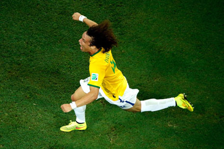 David Luiz of Brazil celebrates scoring his team's second goal on a free kick during the 2014 FIFA World Cup Brazil Quarter Final match between Brazil and Colombia at Castelao on July 4, 2014 in Fortaleza, Brazil.  (GETTY)