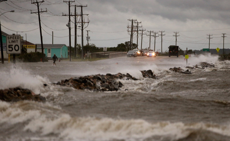 Strong winds and heavy surf cover Hwy 64 at the Albemarle Sound caused by Hurricane Arthur on July 3, 2014 in Nags Head, North Carolina. Hurricane Arthur hit North Carolina's Outer Banks overnight causing wide spead power outages and minimal flooding and damage. (Getty Images/AFP)