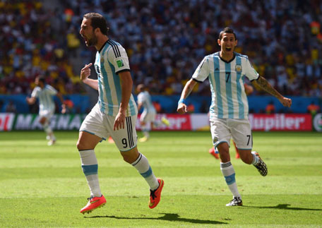 Gonzalo Higuain (left) of Argentina celebrates scoring his team's first goal with Angel di Maria during the 2014 FIFA World Cup Brazil Quarter Final match between Argentina and Belgium at Estadio Nacional on July 5, 2014 in Brasilia, Brazil.  (GETTY)