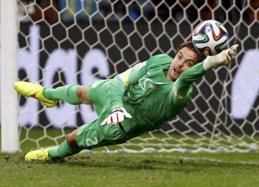 Goalkeeper Tim Krul of the Netherlands saves the last penalty shot against Costa Rica during a penalty shootout in their 2014 World Cup quarter-finals at the Fonte Nova arena in Salvador July 5, 2014. (REUTERS)