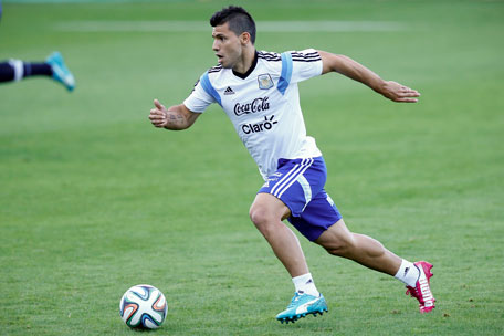 Argentina's Sergio Aguero runs with the ball during a training session in Vespesiano, near Belo Horizonte, Brazil, Sunday, July 6, 2014. (AP)