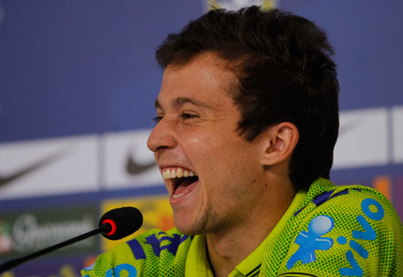 Brazil's Bernard laughs during a press conference at the Granja Comary training center in Teresopolis, Brazil, Sunday, July 6, 2014. (AP)