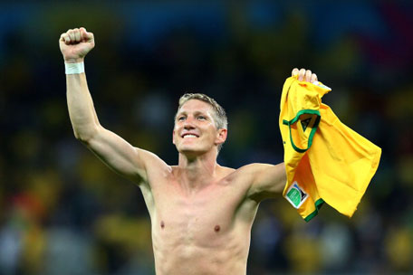 Bastian Schweinsteiger of Germany acknowledges the fans after a 7-1 victory during the 2014 FIFA World Cup Brazil Semi Final match between Brazil and Germany at Estadio Mineirao on July 8, 2014 in Belo Horizonte, Brazil. (GETTY)
