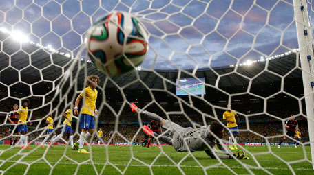 GOAL NO.4: Germany's Toni Kroos (right) scores their fourth goal during their 2014 World Cup semi-finals against Brazil at the Mineirao stadium in Belo Horizonte July 8, 2014. (REUTERS)