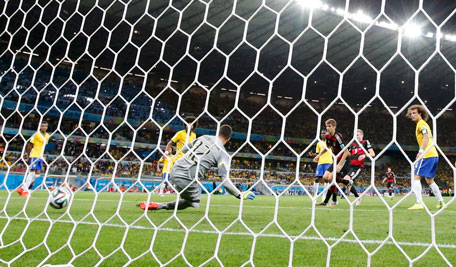 GOAL NO.6: Germany's Andre Schuerrle (9) scores their sixth goal during their 2014 World Cup semi-finals against Brazil at the Mineirao stadium in Belo Horizonte July 8, 2014. (REUTERS)