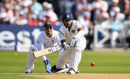 India batsman Murali Vijay prepares to sweep as England wicketkeeper Matt Prior looks on during day one of the 1st Investec Test Match between England and India at Trent Bridge on July 9, 2014 in Nottingham, England. (GETTY)
