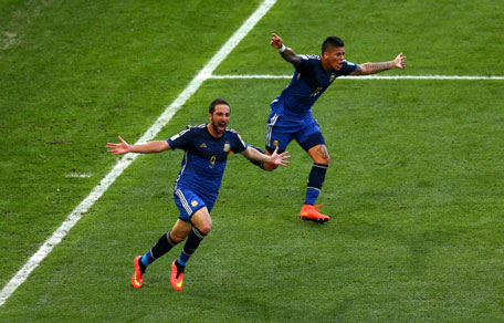 Gonzalo Higuain of Argentina celebrates scoring a disallowed goal with teammate Marcos Rojo during the 2014 FIFA World Cup Brazil Final match between Germany and Argentina at Maracana on July 13, 2014 in Rio de Janeiro, Brazil. (GETTY)