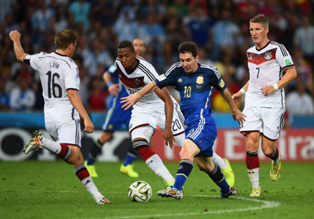 Lionel Messi of Argentina takes on (from) Philipp Lahm and Jerome Boateng Germany during the 2014 FIFA World Cup Brazil Final match between Germany and Argentina at Maracana on July 13, 2014 in Rio de Janeiro, Brazil. (GETTY)
