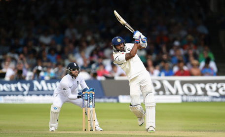 India batsman Murali Vijay hits out watched by Matt Prior during day three of 2nd Test between England and India at Lord's Cricket Ground on July 19, 2014 in London, United Kingdom. (GETTY)
