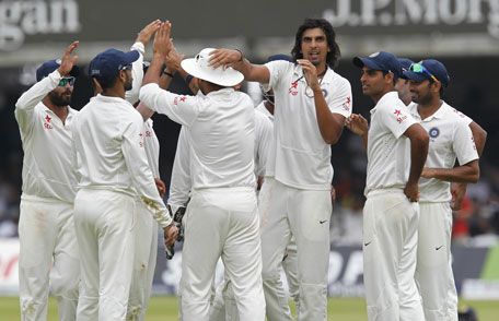 India’s Ishant Sharma (fourth right) celebrates taking the wicket of England’s Matt Prior on the fifth day of the second Test between England and India at Lord's cricket ground in London on July 21, 2014. (AFP)