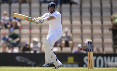 England's Ian Bell hits out during the third Test match against India at the Rose Bowl cricket ground, Southampton, England July 28, 2014. (REUTERS)