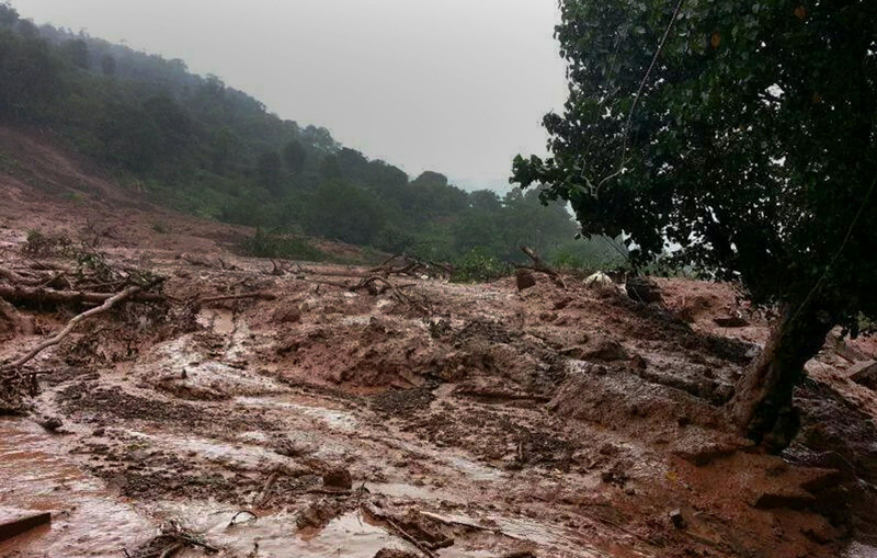 A mudslide is seen in Malin village in Pune district the western Indian state of Maharashtra on July 30, 2014. (AFP)