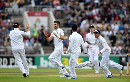 England bowler James Anderson (centre) celebrates with team mates after dismissing India batsman Murali Vijay during day one of the 4th Investec Test match between England and India at Old Trafford on August 7, 2014 in Manchester, England. (GETTY)