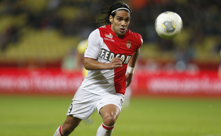 This file picture taken on November 8, 2013 show Monaco's Colombian forward Radamel Falcao eyeing the ball during the French L1 football match Monaco (ASM) vs Evian TG (EVTG) at the Louis II Stadium in Monaco. Manchester United have agreed a sensational deal to sign Colombia striker Radamel Falcao on a season-long loan from Monaco, according to widespread British media reports on September 1, 2014.  (AFP)