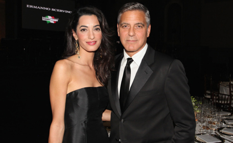 George Clooney and Amal Alamuddin attend the Celebrity Fight Night gala celebrating Celebrity Fight Night In Italy benefitting The Andrea Bocelli Foundation and The Muhammad Ali Parkinson Center. (Getty Images)