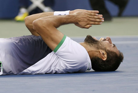 Marin Cilic of Croatia celebrates after defeating Kei Nishikori of Japan in their men's singles final match at the 2014 US Open tennis tournament in New York, September 8, 2014. (REUTERS)