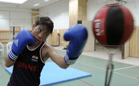 This file photo taken on April 20, 2012 shows Indian boxer Mary Kom working out during a training session for the 2012 London Olympics at the Balewadi Sports Complex in Pune. (AFP)
