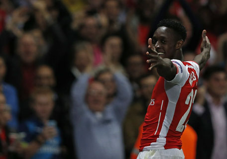 Arsenal's Danny Welbeck celebrates scoring his third goal, Arsenal's fourth during the UEFA Champions League, Group D football match between Arsenal and Galatasaray at The Emirates Stadium in north London on October 1, 2014. (AFP)