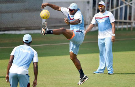 West Indies players warming up at the Kochi ground. (COURTESY sports.ndtv.com)