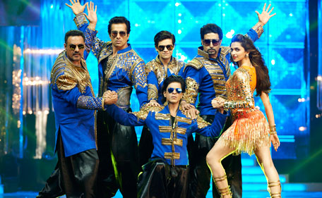 Cast of 'Happy New Year' including Shah Rukh Khan (C), Deepika Padukone (from R-L), Abhishek Bachchan, Vivaan Shah, Sonu Sood and Boman Irani. (SUPPLIED)