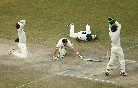 Steve Smith of Australia avoids being run out during Day Four of the First Test between Pakistan and Australia at Dubai International Stadium on October 25, 2014 in Dubai, UAE. (GETTY)