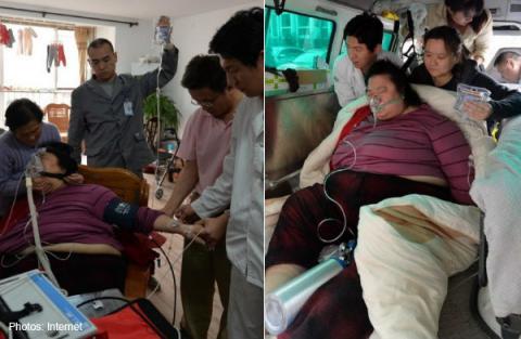Pictures of the obese woman being moved have been going viral on social media networks. (Pic credit: asiaone.com)