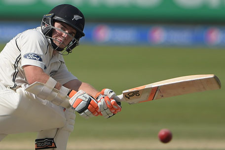New Zealand batsman Tom Latham plays a shot during the first day of the second Test match between Pakistan and New Zealand at Dubai International Stadium in Dubai on November 17, 2014. (AFP)