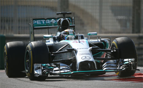 Mercedes-AMG's British driver  Lewis Hamilton drives during the first practice session at the Yas Marina circuit in Abu Dhabi on November 21, 2014 ahead of the Abu Dhabi Formula One Grand Prix. (AFP)