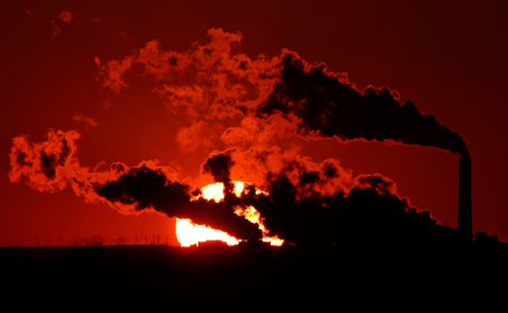 In this March 8, 2014 file photo, steam from the Jeffrey Energy Center coal-fired power plant is silhouetted against the setting sun near St. Mary's, Kan. A groundbreaking agreement struck Wednesday, Nov. 12, 2014, by the United States and China puts the world's two worst polluters on a faster track to curbing the heat-trapping gases blamed for global warming. Energized by these new targets set by China and the United States, the world’s top climate polluters, U.N. global warming talks resume Dec. 1, 2014 in Peru, with unusual optimism despite evidence that human-generated climate change is already happening and bound to get worse. (AP)