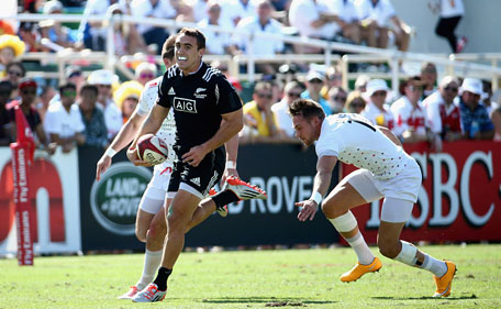 Joe Webber of New Zealand scores a try against England in the Cup Quarter Final during day two of the Emirates Dubai Sevens - HSBC Sevens World Series at The Sevens Stadium on December 6, 2014 in Dubai, UAE. (Getty)
