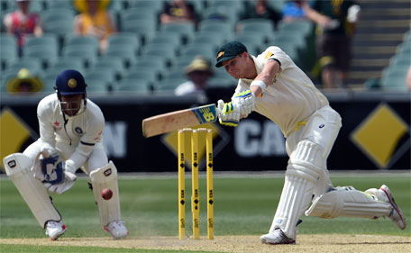 Australia's batsman Steve Smith plays a shot against India on the first day of the first Test between Australia and India at the Adelaide Oval on December 9, 2014.    (AFP)