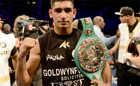 Amir Khan celebrates his 12-round unanimous decision over Devon Alexander during their welterweight bout at the MGM Grand Garden Arena on December 13, 2014 in Las Vegas, Nevada. (AFP)