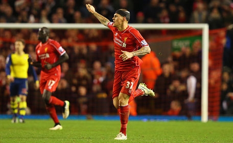 Martin Skrtel of Liverpool celebrates scoring his goal during the Barclays Premier League match between Liverpool and Arsenal at Anfield on December 21, 2014 in Liverpool, England. (Getty)